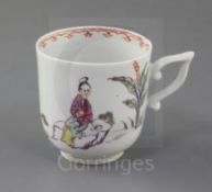 An early Derby coffee cup, c.1756-8, with wishbone handle, painted with Chinese figures and a dog in