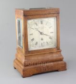 John Walker of London. A Victorian oak cased mantel timepiece, with silvered dial numbered 4326