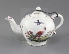 A Derby globular teapot and cover, c. 1760-5, painted with three exotic birds, one in flight, the