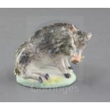 A rare Derby small figure of a seated wild boar, c.1760, on an oblong base, pad marks, h. 6.3cm,