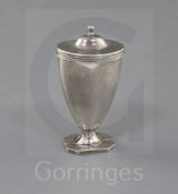 A George III silver vase shaped nutmeg grater, with hinged lid and base, maker possibly William
