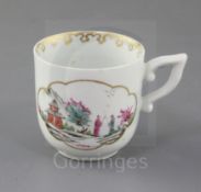 An early Derby coffee cup, c.1756-9, with wishbone handle, finely painted in Chinese famille rose