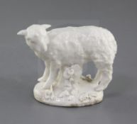 A rare Derby 'Dry-Edge' figure of a lamb, c.1750-5, standing with its belly supported by a stump, on