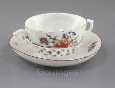 A rare Derby trembleuse cup and saucer, c.1758, the saucer with raised gallery applied with