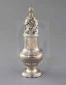 A George II silver caster by Samuel Wood, engraved with the Heneage family crest, of baluster