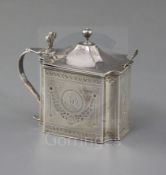 A George III bright cut engraved silver mustard pot by John Wakefield, of rectangular form with