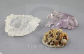 A Chinese jade hat finial and two rock crystal carvings, the grey and russet jade hat finial