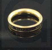 An early George III gold and black enamel mourning band, inscribed "Roger Harenc Arm Ob. 10 June,