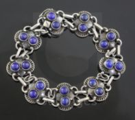 A Danish Georg Jensen sterling silver and lapis lazuli set bracelet, no. 8, 1915-1927 mark, with