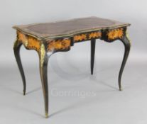 A Victorian marquetry, walnut and ebony serpentine writing table, with two frieze drawers, on ormolu