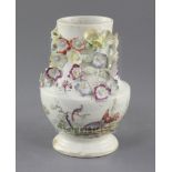 A rare Derby baluster shaped jar, c.1756-9, the neck floral encrusted, painted in 'Cotton-stem