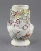 A rare Derby baluster shaped jar, c.1756-9, the neck floral encrusted, painted in 'Cotton-stem