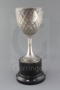 A Victorian silver presentation trophy cup, by Richard Sibley, of inverted bell form, with