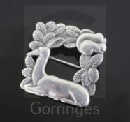 An Arno Malinowski for Georg Jensen sterling silver square squirrel and deer brooch, no. 318, 1933-