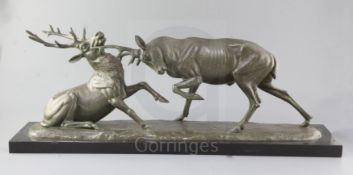 Irénée Rochard (1906-1984). A French Art Deco bronzed spelter group of two fighting stags, signed,