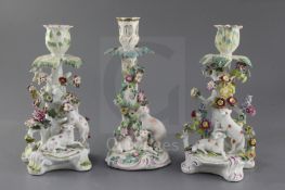 Three early Derby candlestick groups, c.1758-60, two of the candlesticks modelled with two sheep,