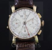 A gentleman's 1940's 18ct pink gold Lusina triple calendar chronograph manual wind wrist watch, with