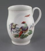 A Derby ovoid mug, c.1760, painted with two exotic birds perched on branches and another in