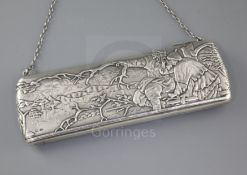 An early 20th century Russian 84 zolotnik silver large rounded rectangular purse, one side decorated