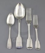 A harlequin canteen of silver fiddle pattern flatware, George III and later, London and Dublin (