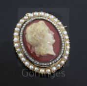 A 19th century gold, diamond and split pearl mounted oval hardstone cameo pendant brooch, carved