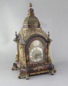 A Victorian ormolu and tortoiseshell mantel clock, in ornate domed case with brass Tempus Fugit dial