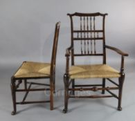 A set of ten 19th century ash, elm and beech spindle back cottage dining chairs, including a pair of