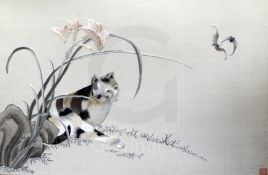 A Chinese embroidered silk picture of a cat, Republic period, the cat below a lily, seal mark, 55