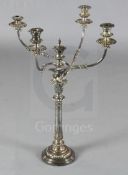 A 19th century Sheffield plate four branch, five light candelabrum, with leaf decorated stem and