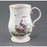A large Derby baluster shaped mug, c.1760, painted with a chicken and a peacock in a landscape,