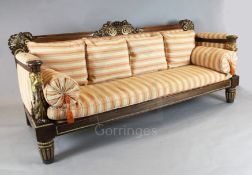 An important Regency parcel gilt rosewood settee in the manner of George Smith the show-wood frame