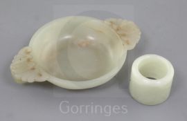A Chinese pale celadon jade small brush washer and an archer's ring, 2.7cm and 10.2cm