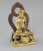 A Chinese gilt bronze seated figure of Amitayus, on a rectangular throne with foliate cast