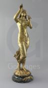 Edouard Drouot (1859-1935). A French ormolu figure of a pipe girl, 'La Muse des Bois', on green