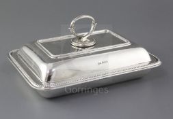 A George V silver rectangular entree dish and cover, Sheffield 1923, makers Walker & Hall, 28.8cm,