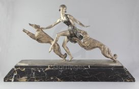 Jean Lormier (French 19th/20th century). An Art Deco patinated bronze group of a young lady with a