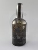 A George III black glass mallet shaped wine bottle, sealed for Jas. Oakes, Bury, 1788, height 26.