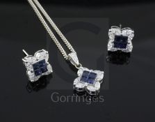 A sapphire and diamond square-set pendant on 18ct white gold fine chain and a pair of earrings en