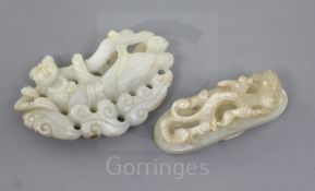 Two Chinese pale celadon jade carvings, Qing dynasty, the first of a flying female deity amid