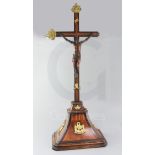 A 19th century Italian ormolu mounted rosewood and walnut crucifix, 33in.