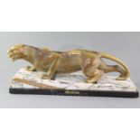 Guy Débe. A French Art Deco patinated spelter model of a crouching leopard, 'Panthere A L'Affut', on
