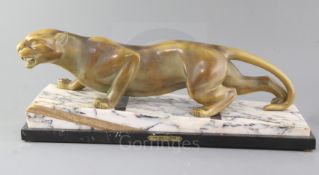 Guy Débe. A French Art Deco patinated spelter model of a crouching leopard, 'Panthere A L'Affut', on