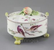 An early Derby butter tub and cover, c.1758, the drum-shaped body painted with two exotic birds on a