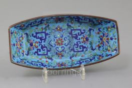 A Guangzhou enamel dish, Qianlong four character mark and of the period (1736-95), decorated with
