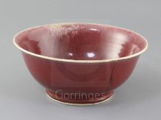 A Chinese Langyao bowl, 18th century, the white rim graduating to copper red, d. 25.5cm, minor