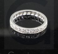 A platinum? and diamond full eternity ring, set with twenty five round cut stones, size N.
