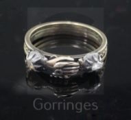 A George III gold, silver and rose cut diamond set gimmel fede ring, the clasped hands parting to
