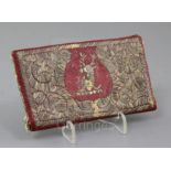 A 18th century Tetuan morocco leather wallet, embroidered with a stag's head crest and Tetuan