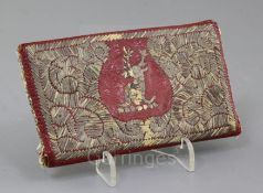 A 18th century Tetuan morocco leather wallet, embroidered with a stag's head crest and Tetuan