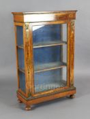 A late Victorian ormolu mounted satinwood and marquetry pier cabinet, with single glazed door, W.2ft